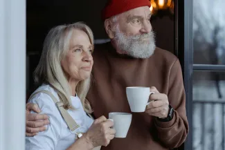 Retired couple having coffee